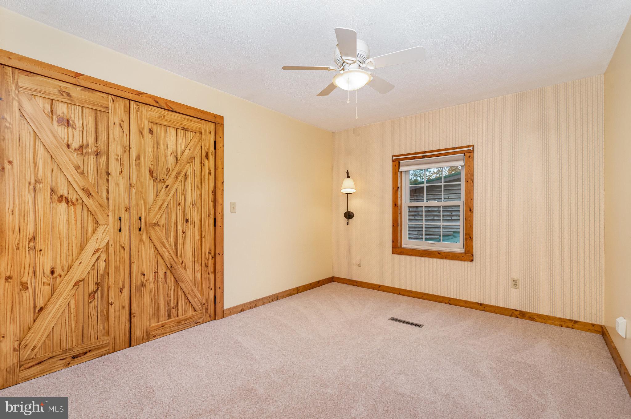 2091 Stumpstown Road Mechanicsburg, PA 17055 - Photo 27 of 52 a view of an empty room with a window