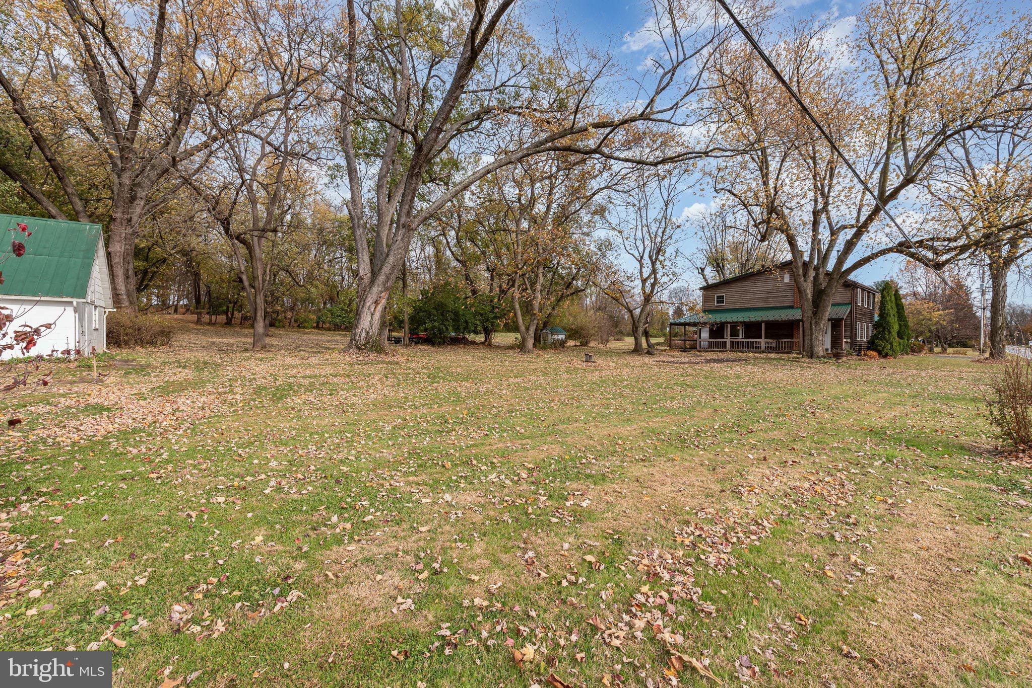 2091 Stumpstown Road Mechanicsburg, PA 17055 - Photo 40 of 52 a view of a yard with a house and trees