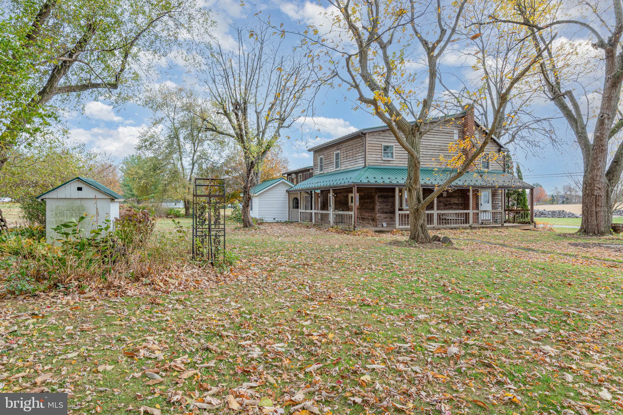 2091 Stumpstown Road Mechanicsburg, PA 17055 - Photo 44 of 52 a front view of a house with a garden