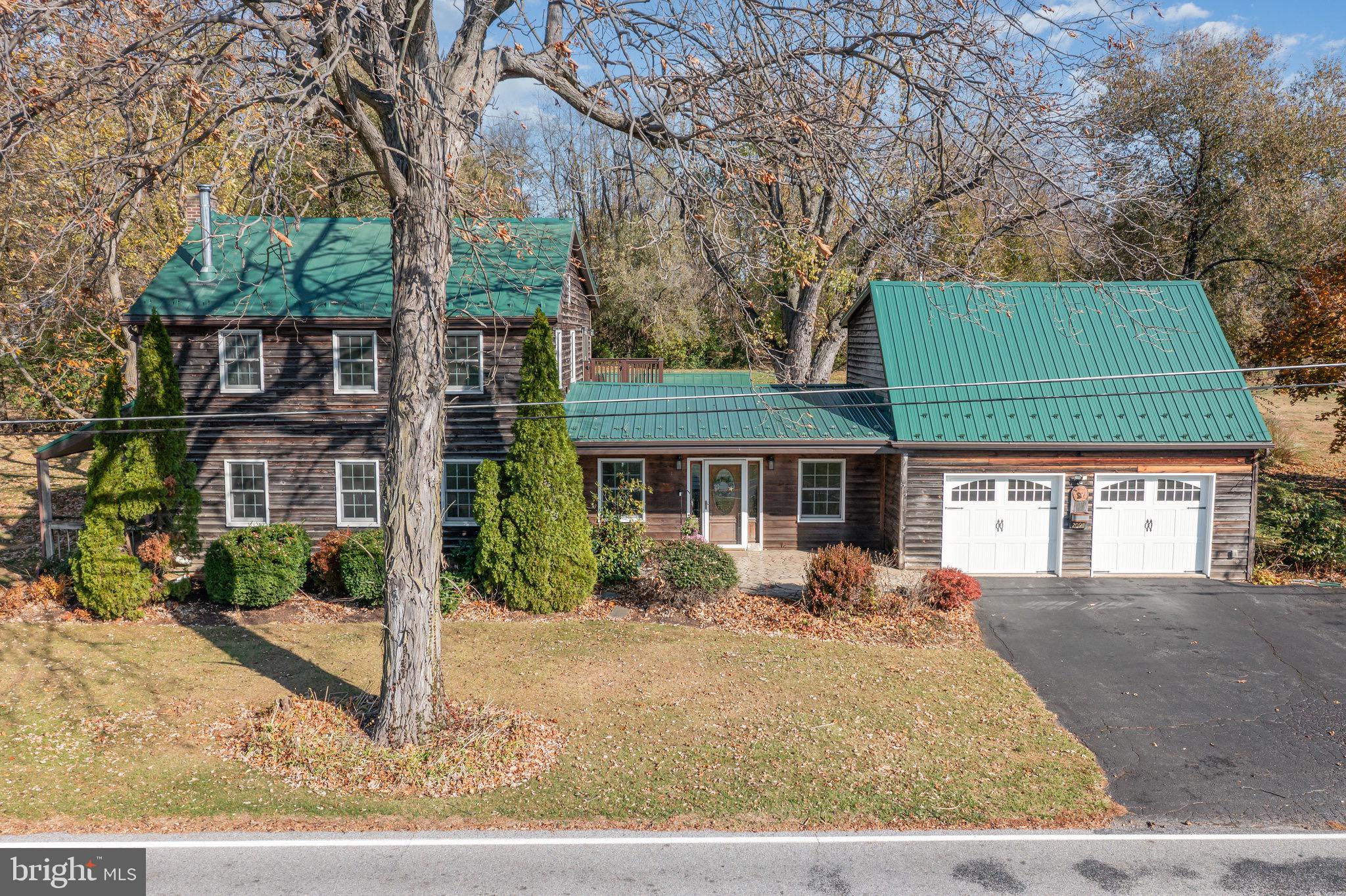 2091 Stumpstown Road Mechanicsburg, PA 17055 - Photo 51 of 52 front view of a house with a yard