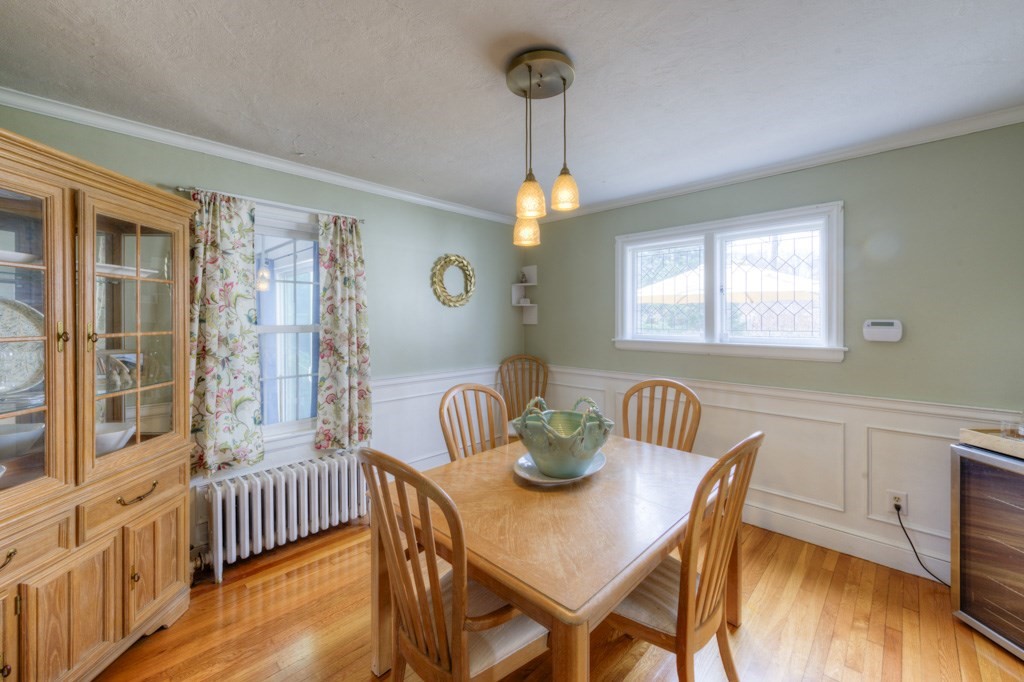 291 Beverly Road Worcester, MA 01605 - Photo 13 of 42 a view of a dining room with furniture window and wooden floor