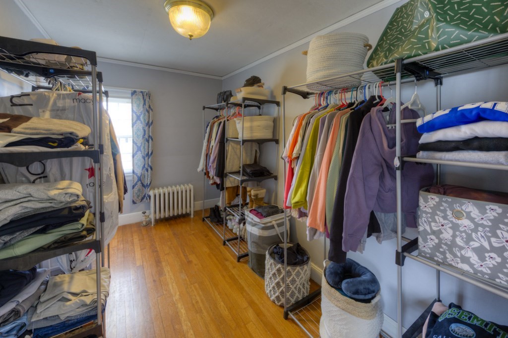 291 Beverly Road Worcester, MA 01605 - Photo 24 of 42 a view of walk in closet with clothes and shoes