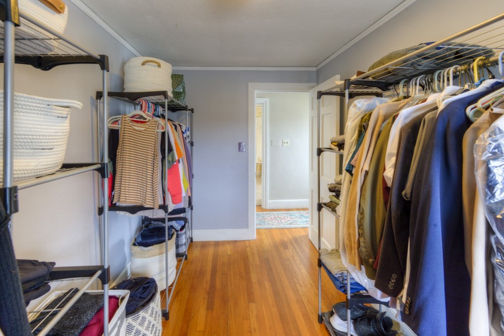 291 Beverly Road Worcester, MA 01605 - Photo 25 of 42 a view of walk in closet with clothes and shoes
