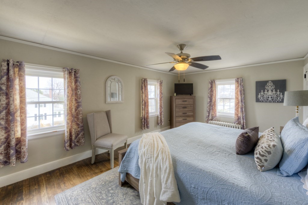 291 Beverly Road Worcester, MA 01605 - Photo 32 of 42 a bedroom with a bed chairs and window