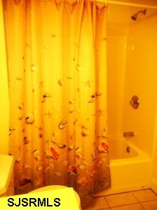 1301 West Avenue, Unit B Ocean City, NJ 08226 - Photo 11 of 11 a bathroom with a sink