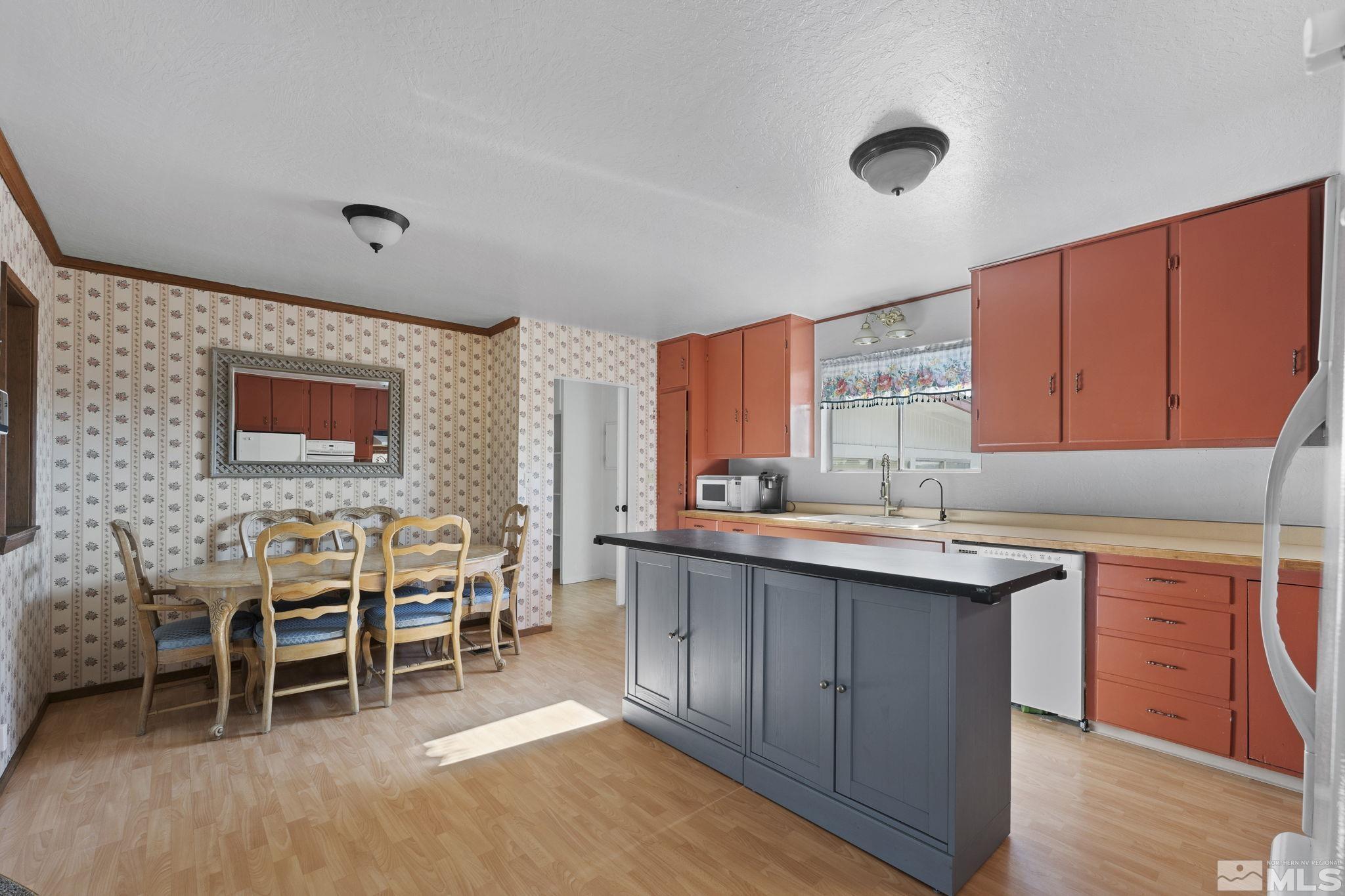 2375 Rice Road Fallon, NV 89406 - Photo 10 of 39 a large kitchen with lots of table and chairs