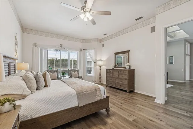 a kitchen with stainless steel appliances kitchen island granite countertop a stove and a microwave