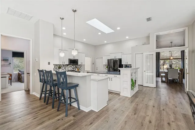 a bathroom with a toilet and a shower curtain