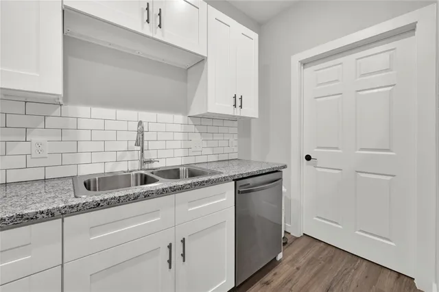 a close view of a sink and a vanity in the bathroom