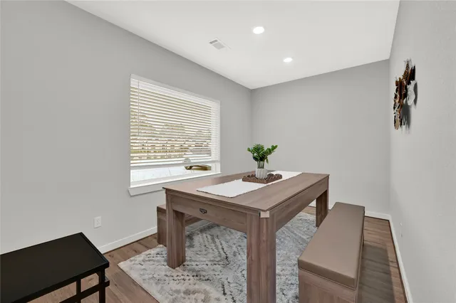 a view of a workspace with furniture