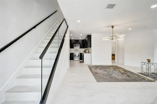 a close view of stove top oven and cabinets