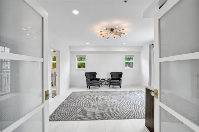 a bedroom with a bed and a couch