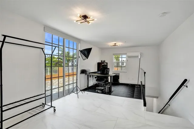 a view of a room with a large window