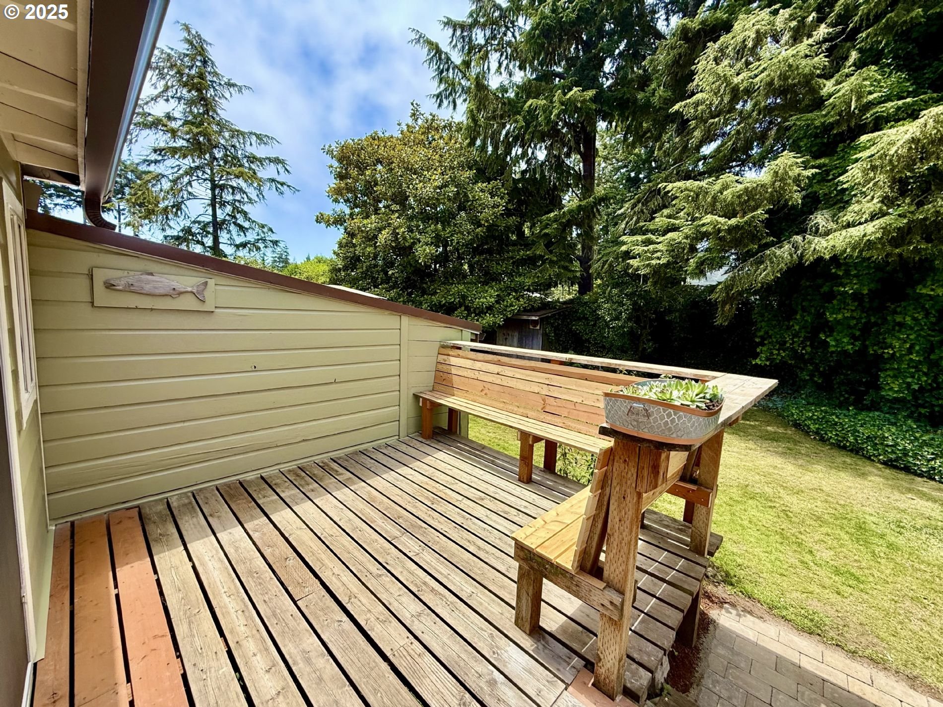 63534 South Olive Road Coos Bay, OR 97420 - Photo 7 of 20 a backyard of a house with seating space