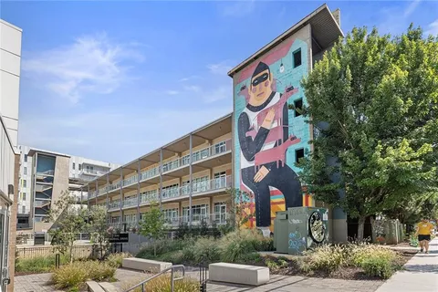 a sign that is on the wall of building