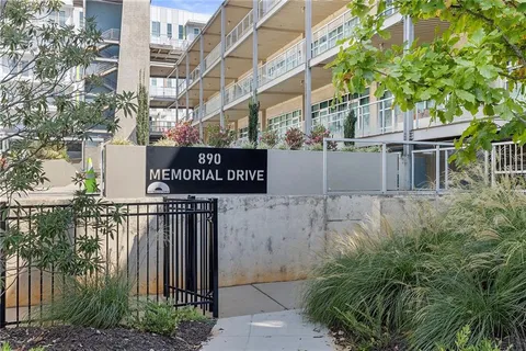 a street sign on a pole on a street