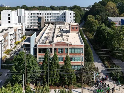 a view of swimming pool with outdoor seating