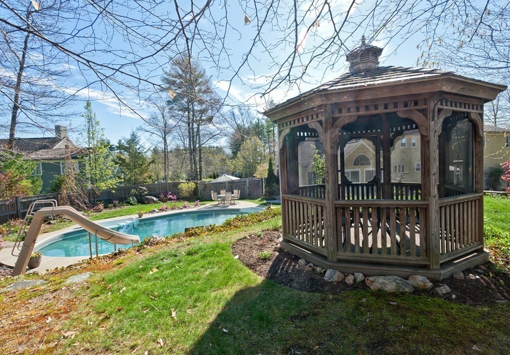 79 Linden Lane Hanover, MA 02339 - Photo 23 of 30 a view of a small house with garden and deck