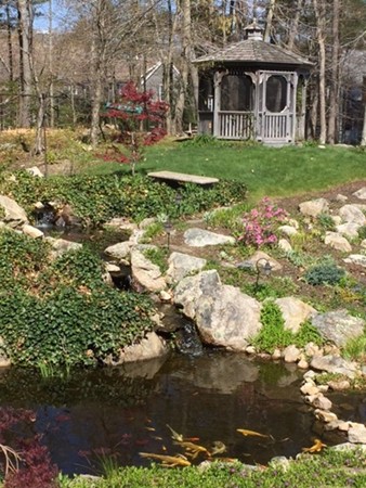 79 Linden Lane Hanover, MA 02339 - Photo 24 of 30 a front view of a house with a yard