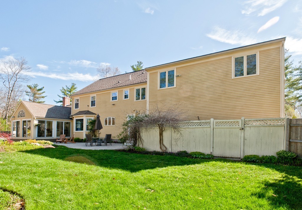 79 Linden Lane Hanover, MA 02339 - Photo 27 of 30 a front view of house with yard and outdoor seating