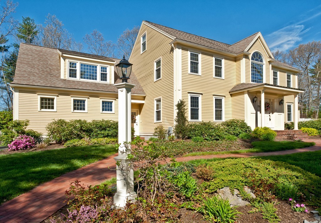 79 Linden Lane Hanover, MA 02339 - Photo 3 of 30 a front view of a house with garden and plants