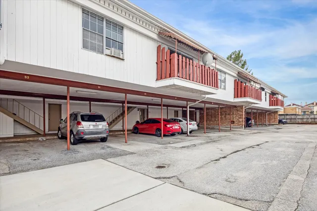 a car parked in front of a building