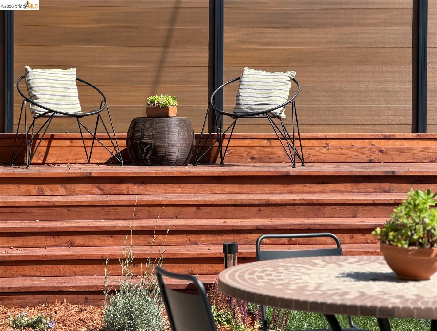 1668 Arch Street Berkeley, CA 94709 - Photo 59 of 78 Multi-level wood deck featuring a privacy screen