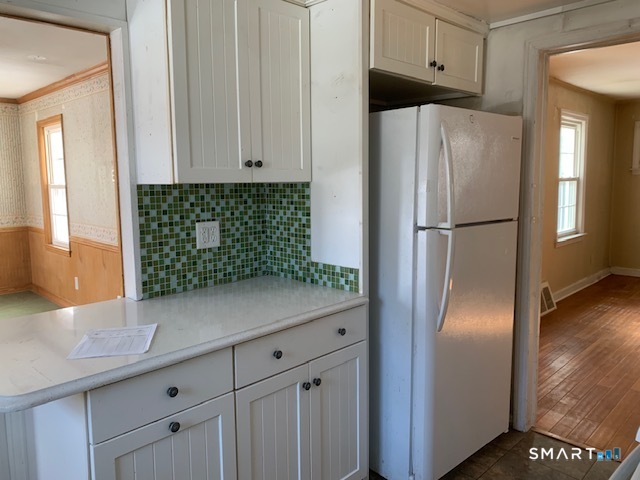 329 Bronson Road Fairfield, CT 06890 - Photo 19 of 23 a kitchen with stainless steel appliances granite countertop a refrigerator and a sink