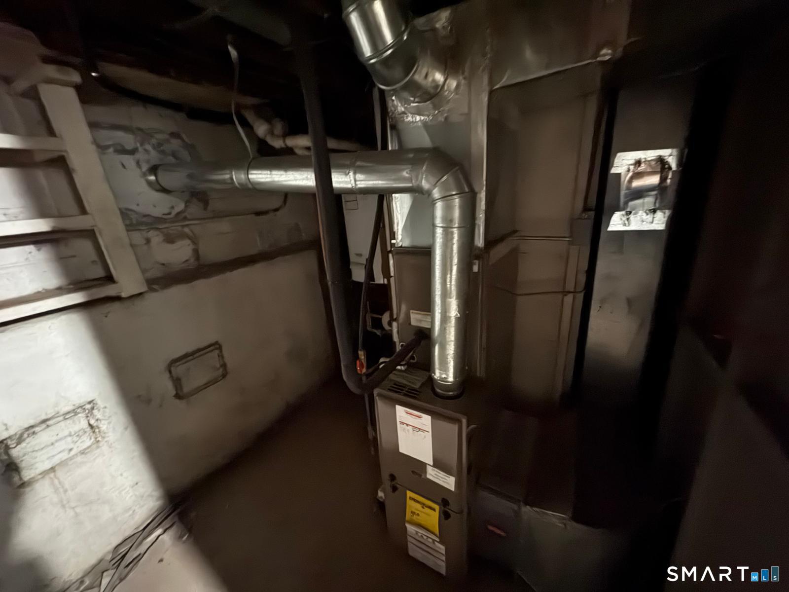 329 Bronson Road Fairfield, CT 06890 - Photo 5 of 23 a view of storage and utility room