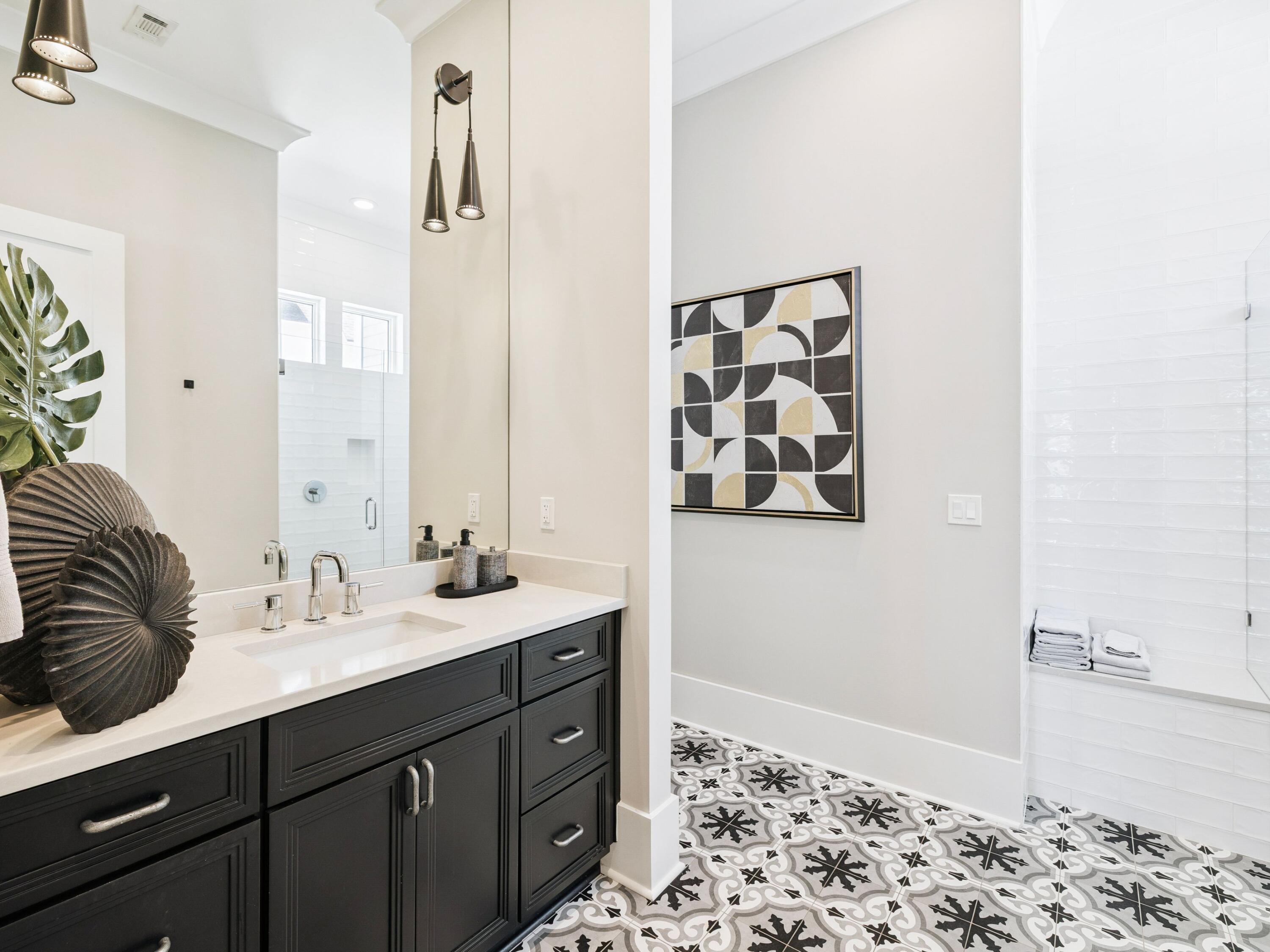 85 Trailhead Drive Watersound, FL 32461 - Photo 12 of 48 a bathroom with a sink and a mirror