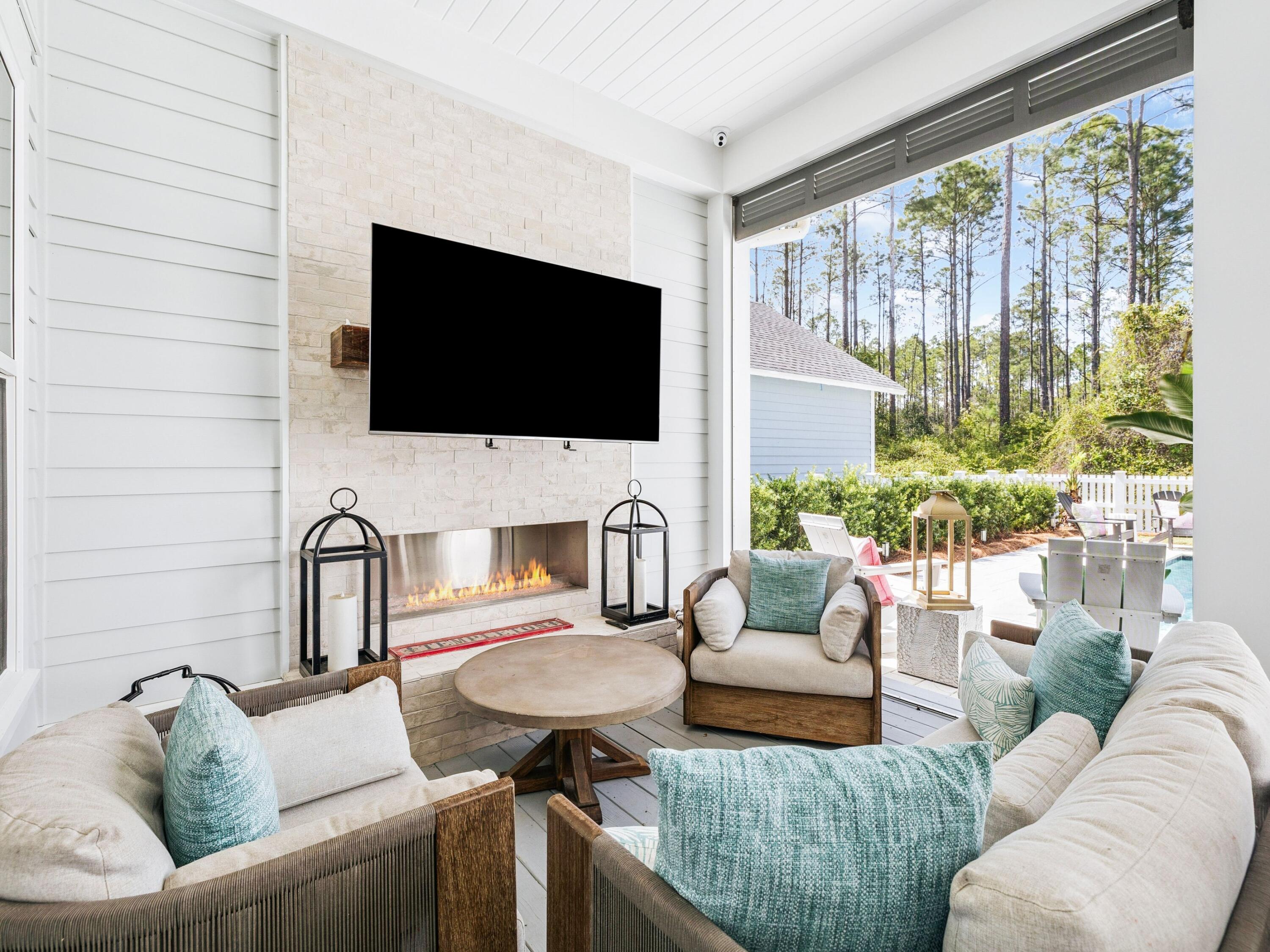 85 Trailhead Drive Watersound, FL 32461 - Photo 34 of 48 a living room with furniture and a flat screen tv