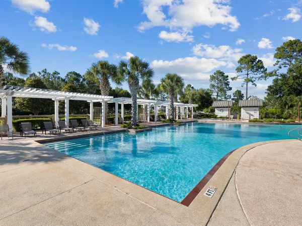 a view of a swimming pool with a patio