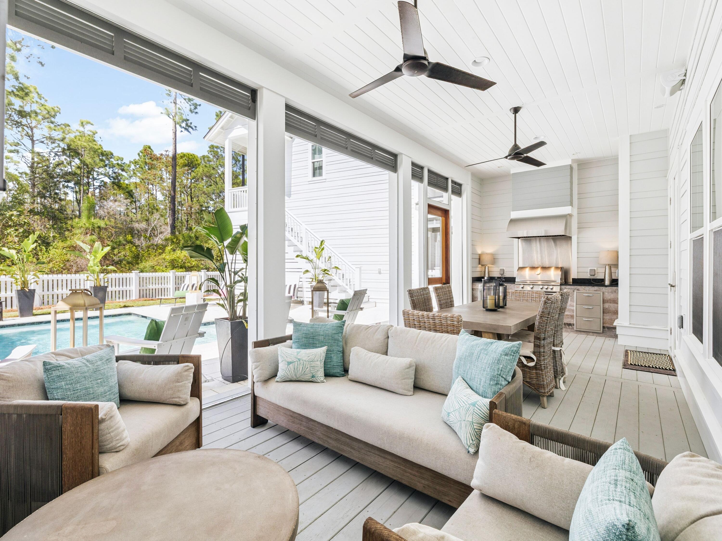 85 Trailhead Drive Watersound, FL 32461 - Photo 6 of 48 a living room with furniture and a large window