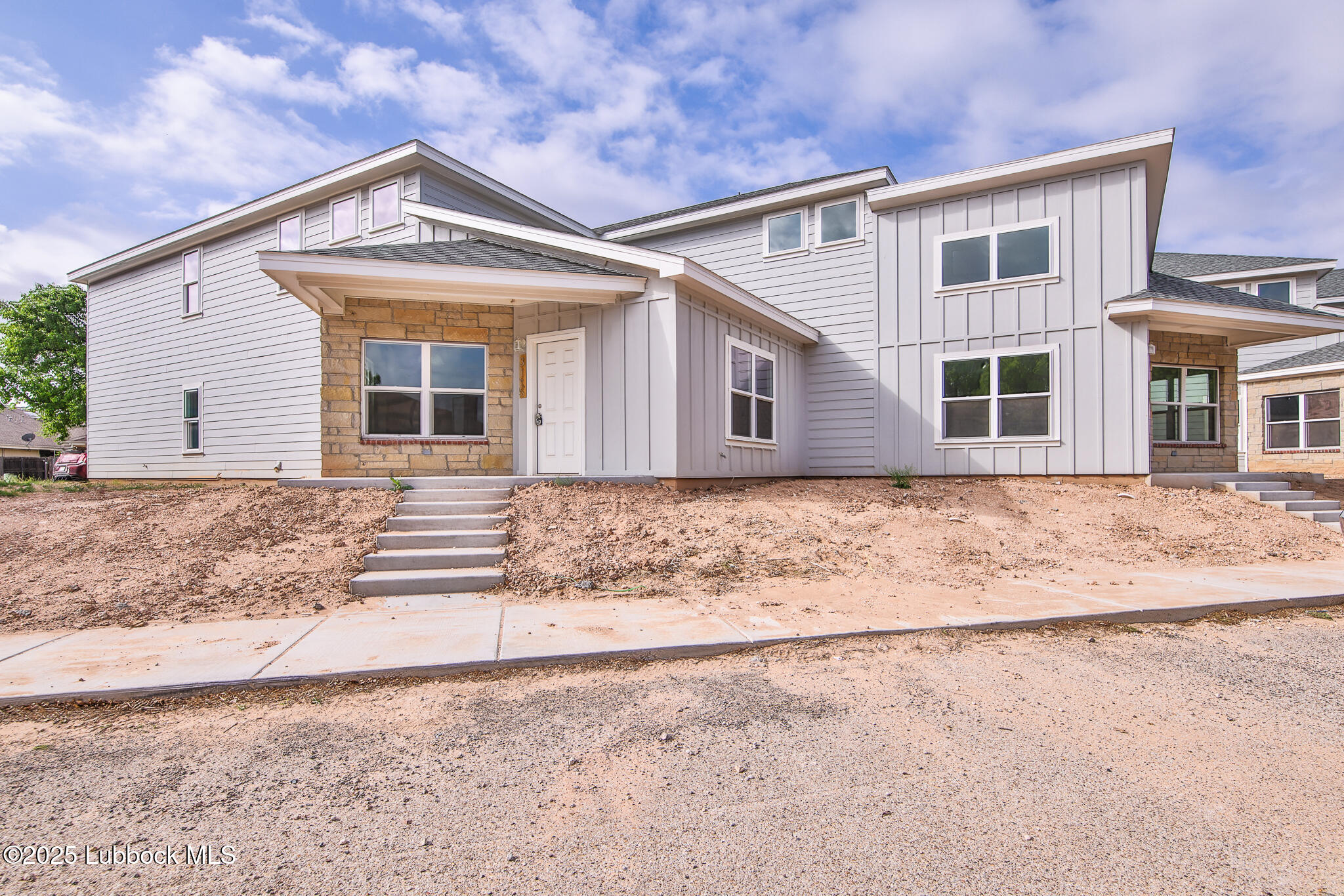 3121 74th Street Lubbock, TX 79423 - Photo 2 of 36 front view of a house with a dry yard