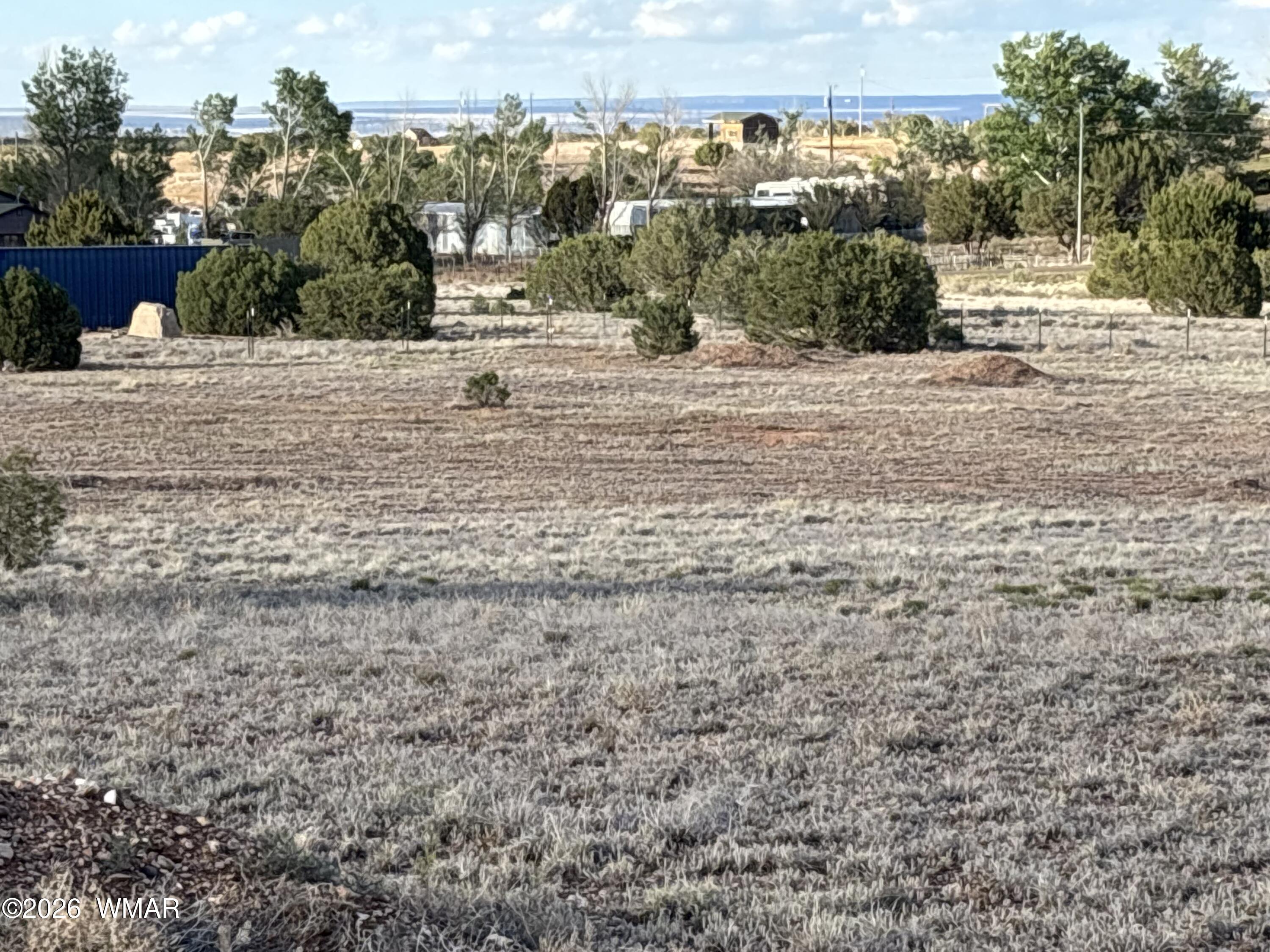 4533 Appaloosa Road Snowflake, AZ 85937 - Photo 6 of 7 a view of a road with a yard