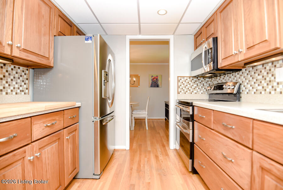 308 Hemingway Road Louisville, KY 40207 - Photo 29 of 61 KITCHEN FROM DINING ROOM