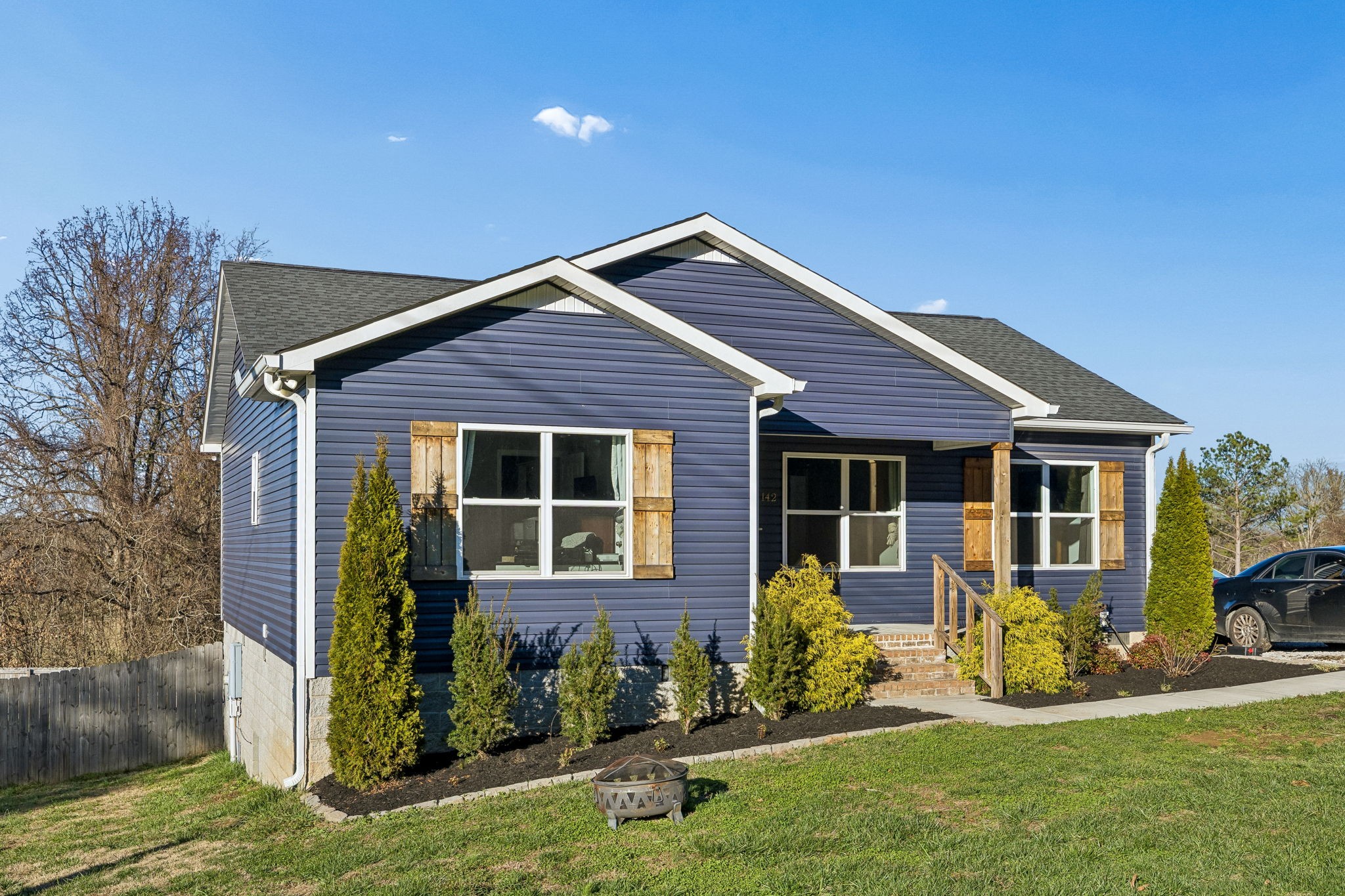 142 Pine Avenue Morrison, TN 37357 - Photo 23 of 29 a front view of a house with yard and green space