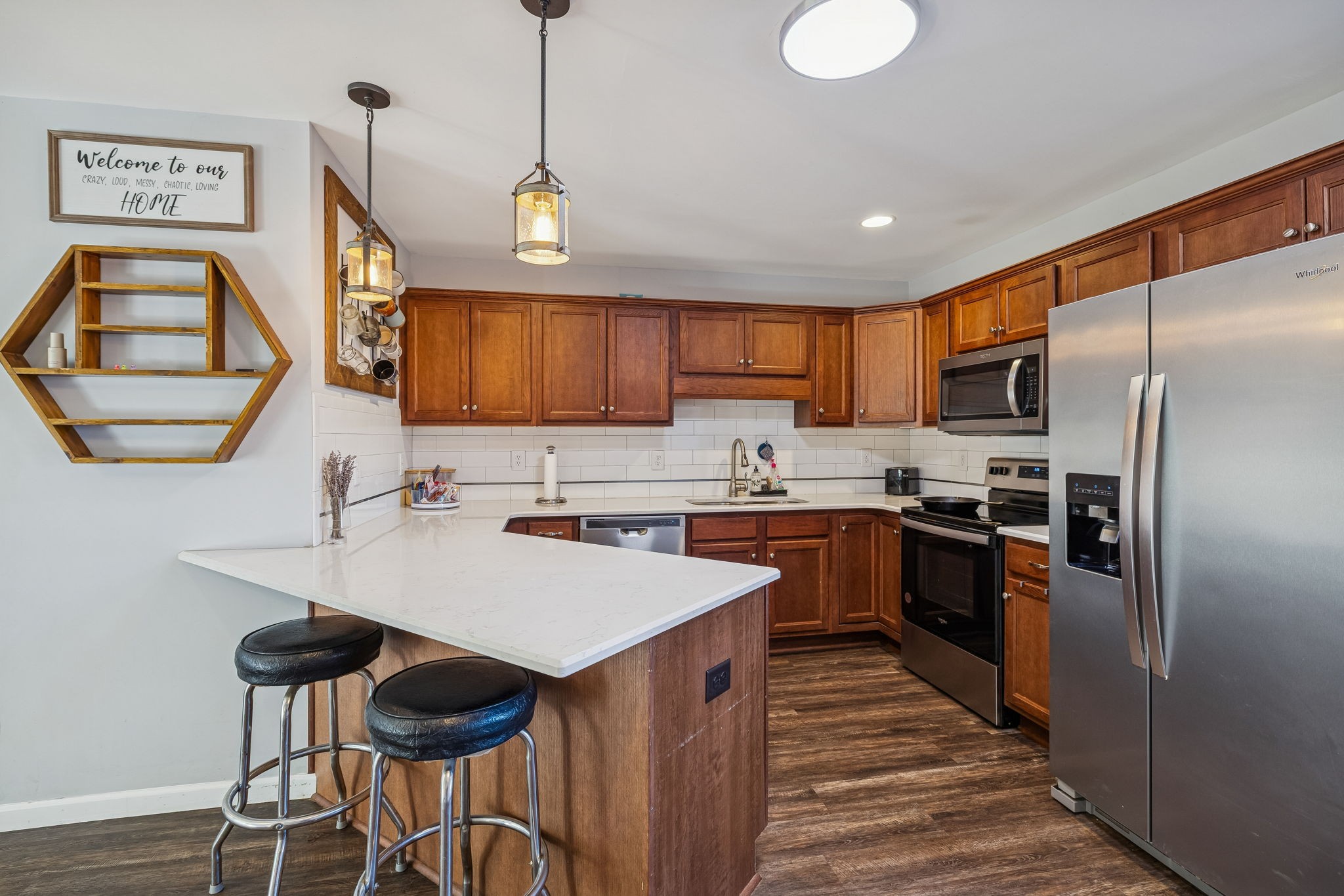 142 Pine Avenue Morrison, TN 37357 - Photo 7 of 29 a kitchen with granite countertop counter space a sink appliances and cabinets