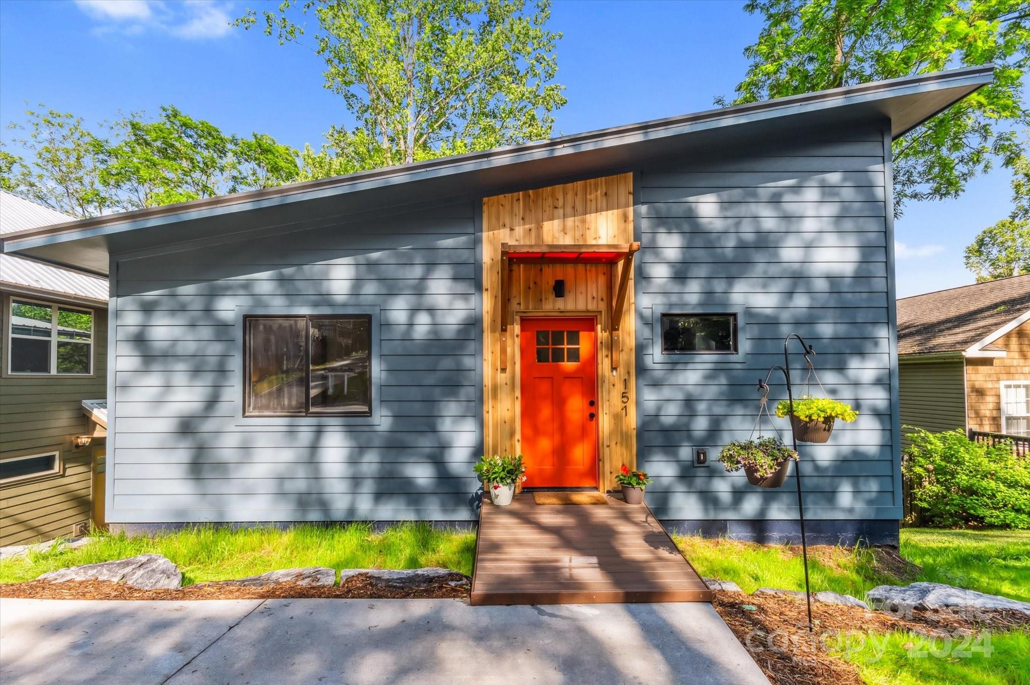 a view of a house with swimming pool