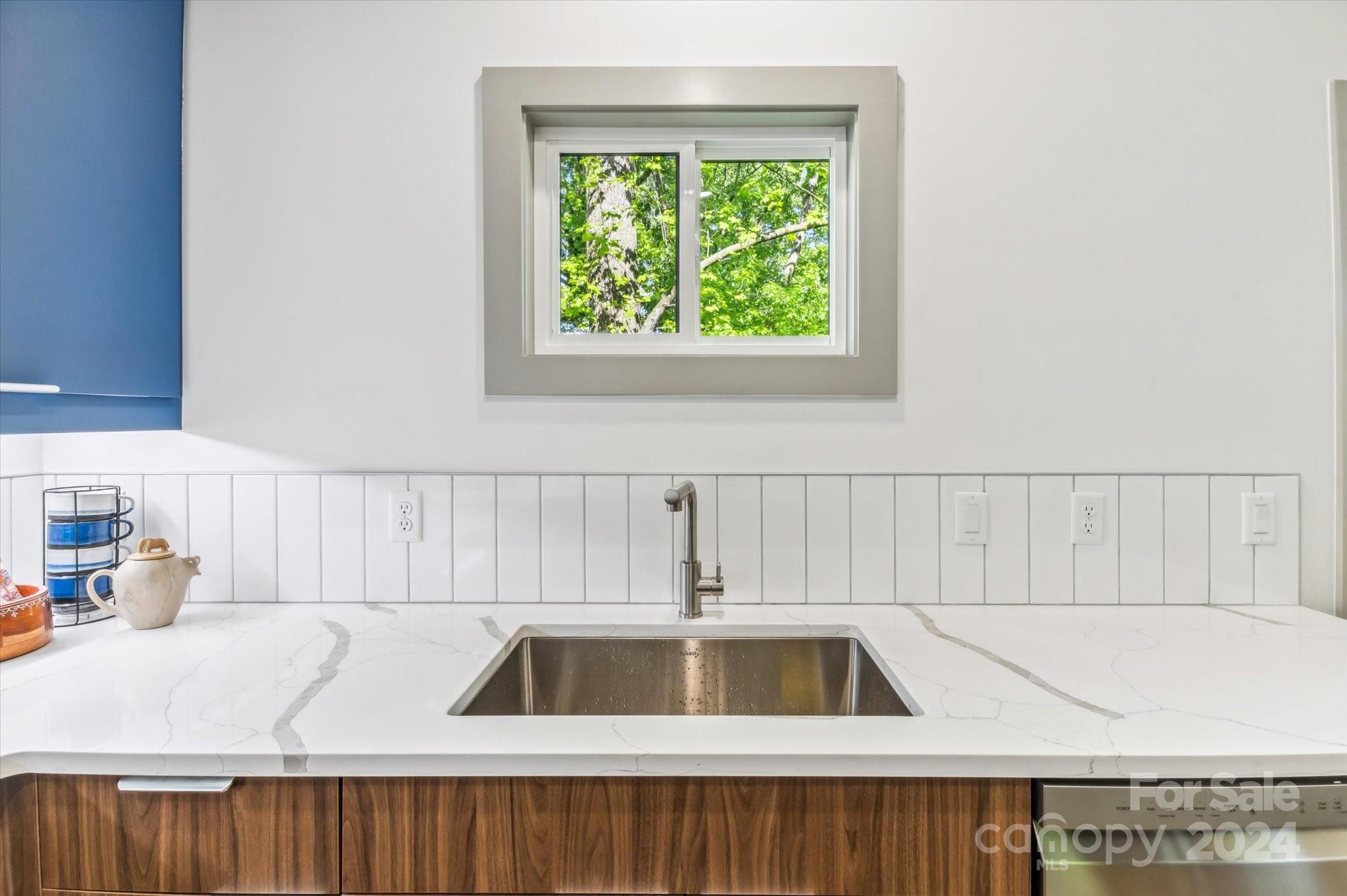 151 Laurel Loop Asheville, NC 28806 - Photo 14 of 35 a kitchen with a sink and a window