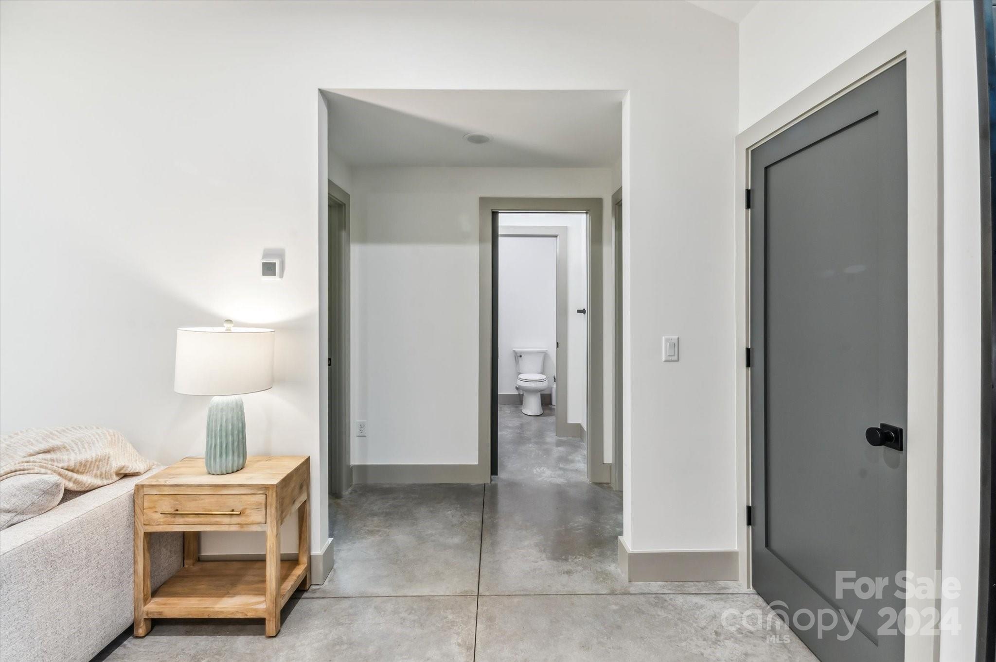 151 Laurel Loop Asheville, NC 28806 - Photo 25 of 35 a room that has a table and a chair in it