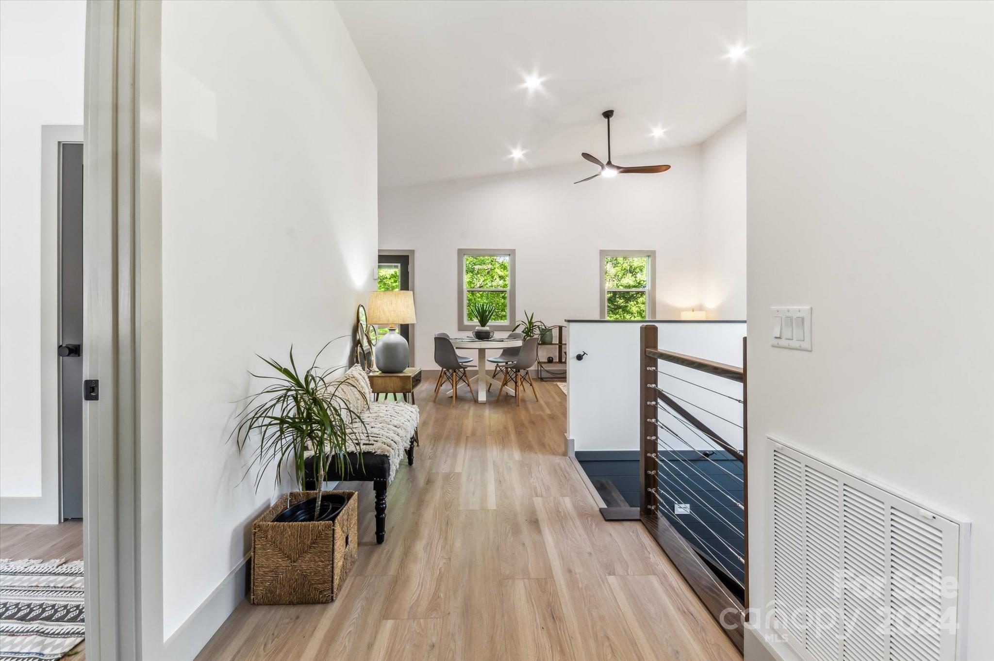 151 Laurel Loop Asheville, NC 28806 - Photo 6 of 35 wooden floor view with a large window and wooden floor