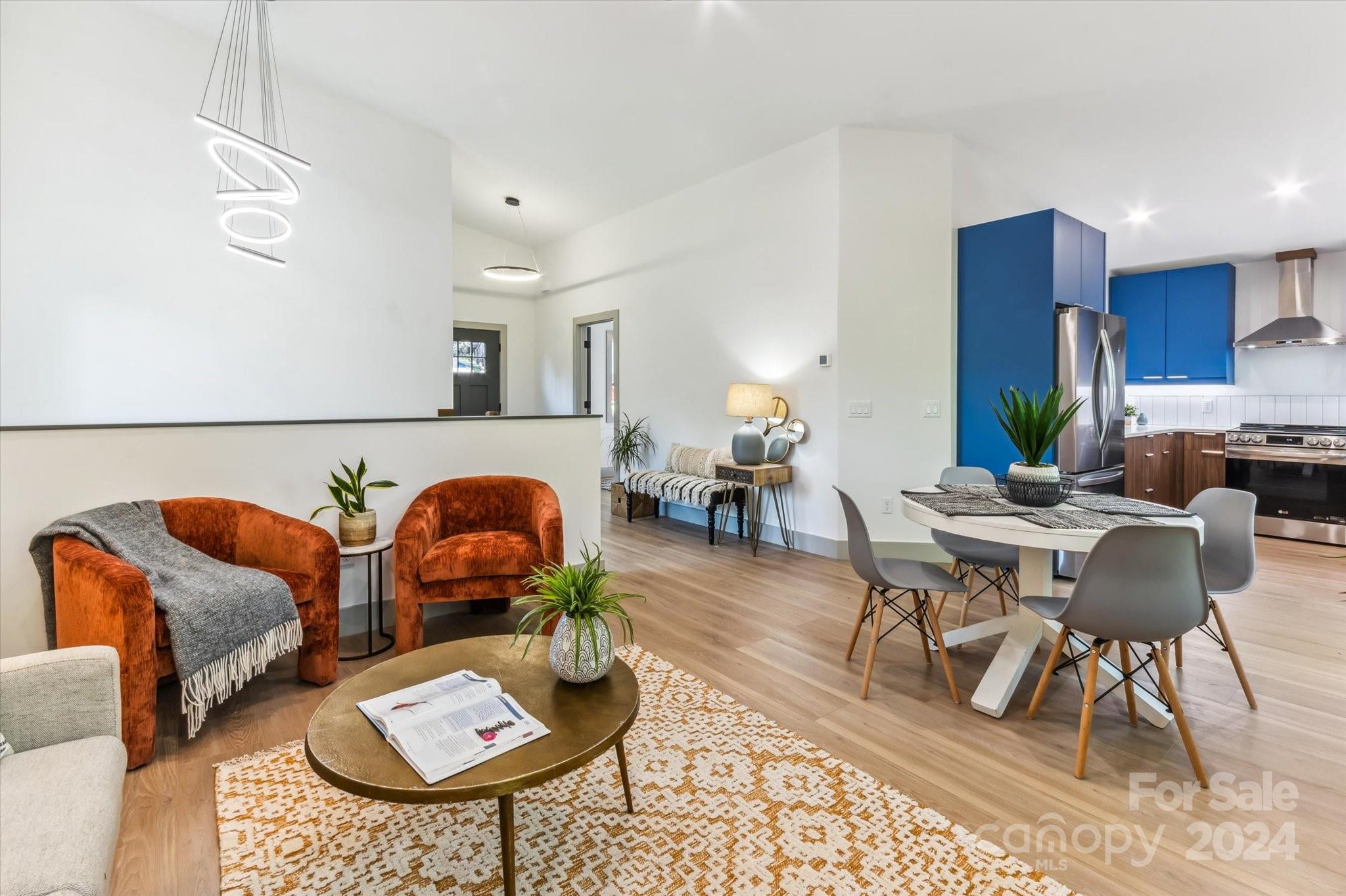 151 Laurel Loop Asheville, NC 28806 - Photo 8 of 35 a living room with furniture and wooden floor