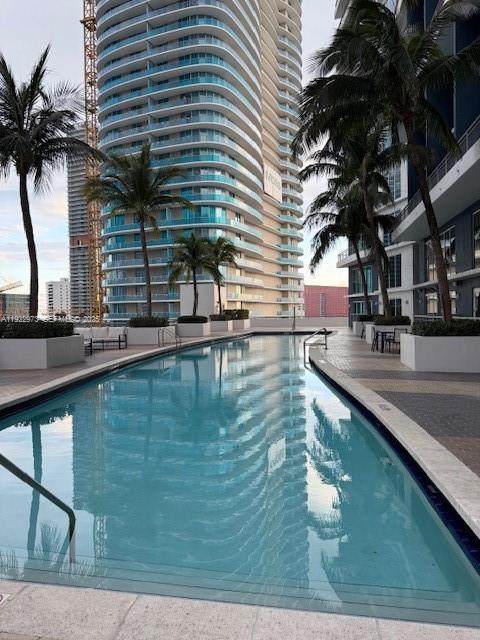 60 Southwest 13th Street, Unit 3620 Miami, FL 33130 - Photo 16 of 30 a view of a swimming pool with a patio
