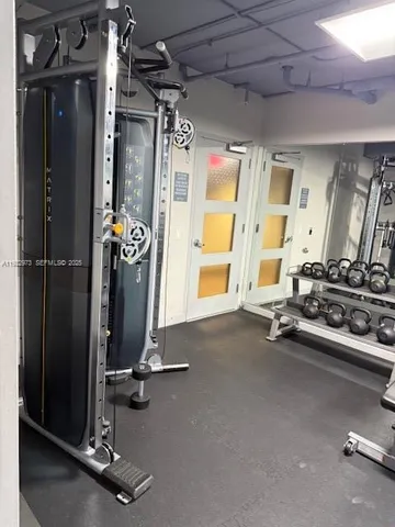 a view of a room with gym equipment