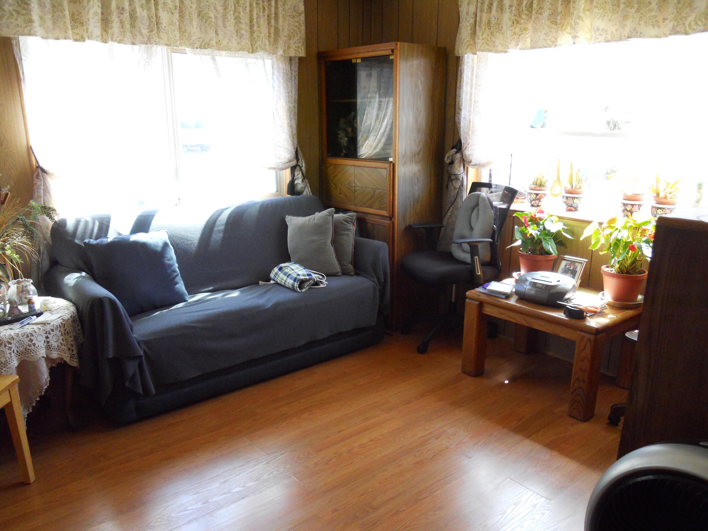 520 Pine Avenue, Unit 33 Goleta, CA 93117 - Photo 6 of 16 a living room with furniture and a large window