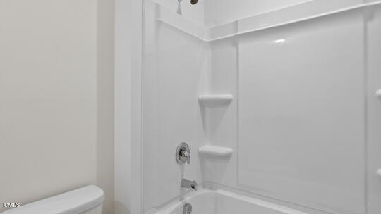 824 Comice Pear Way Willow Spring, NC 27592 - Photo 33 of 43 a bathroom with a shower