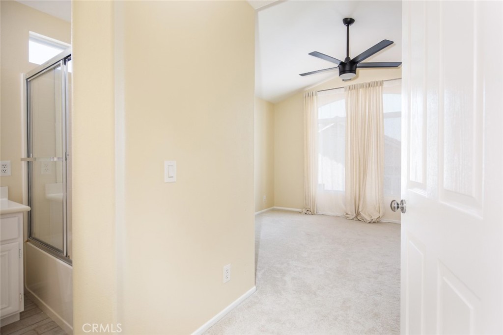 1 Quebec Aliso Viejo, CA 92656 - Photo 14 of 40 a view of a livingroom with a ceiling fan and window