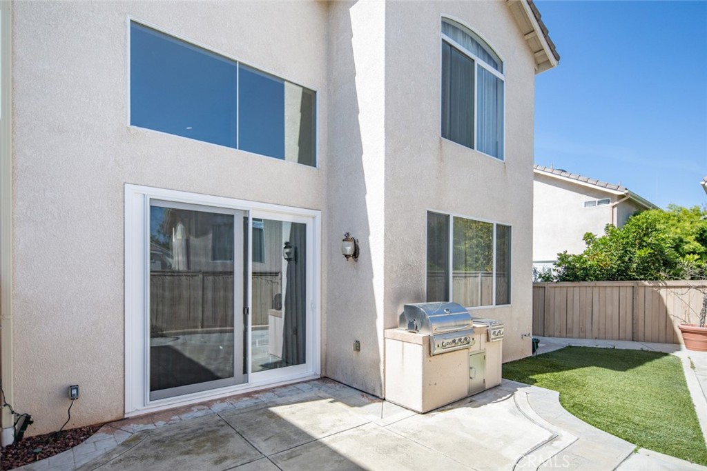 1 Quebec Aliso Viejo, CA 92656 - Photo 28 of 40 a front view of a house with a yard
