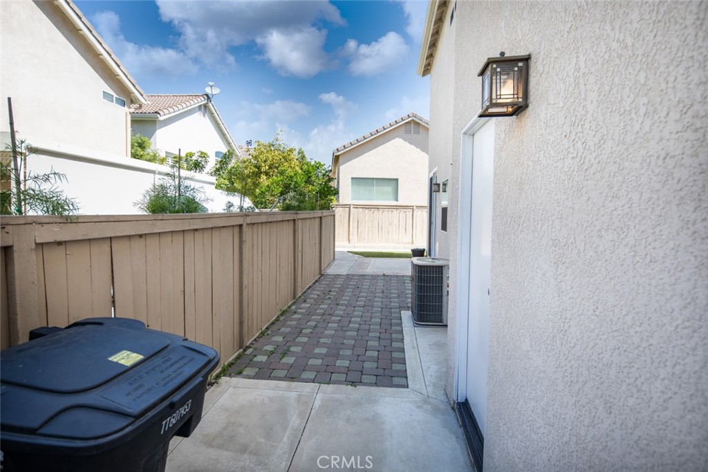 1 Quebec Aliso Viejo, CA 92656 - Photo 32 of 40 a view of a hallway and a dining room with wooden floor